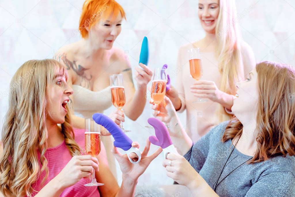 Best friends having fun during an adult toy party