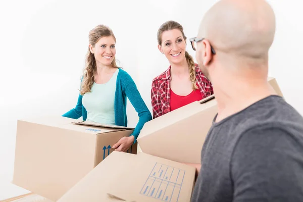 Group of friends holding the cardboard boxes — Stock Photo, Image