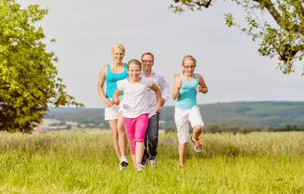 Family rollerblade with skates on country lane — Stock Photo, Image