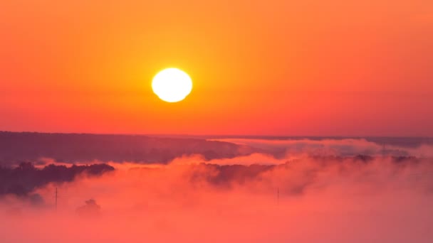 Timelapse of sunrise on misty valley — Stock Video