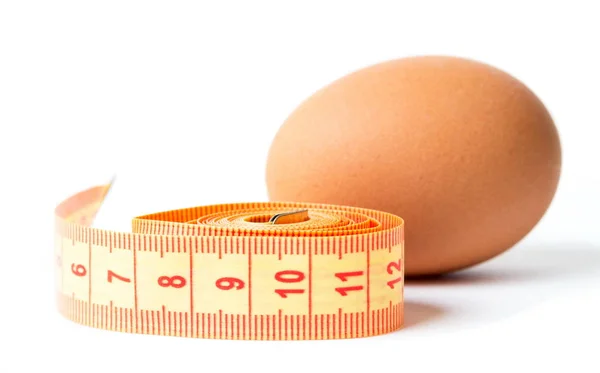 Eggs with the diet meter on the white — Stock Photo, Image