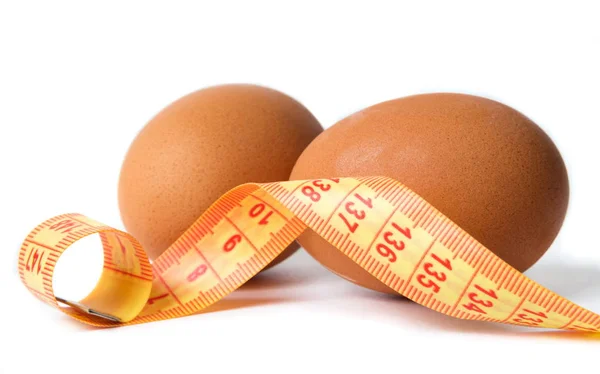 Eggs with the diet meter on the white — Stock Photo, Image