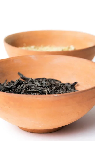 Dry tea leaves in the bowl — Stock Photo, Image