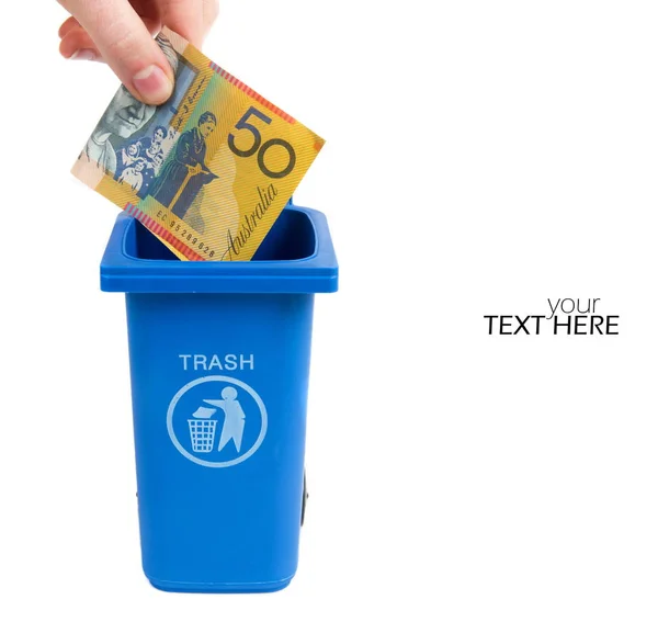 Австралийские деньги в мусорном баке — стоковое фото