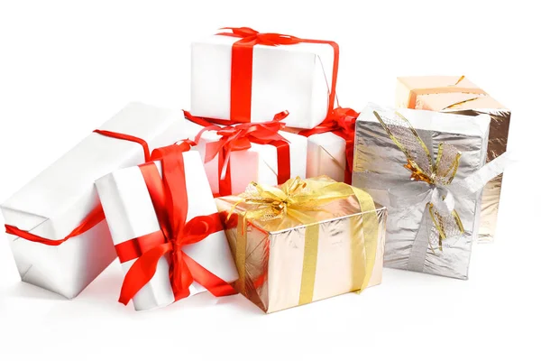 Holiday gift boxes decorated with ribbon isolated on white background — Stock Photo, Image