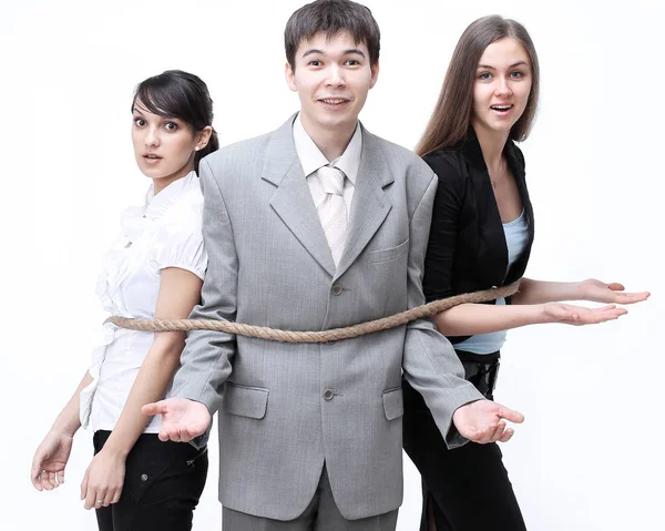 Young business people tied up together against — Stock Photo, Image