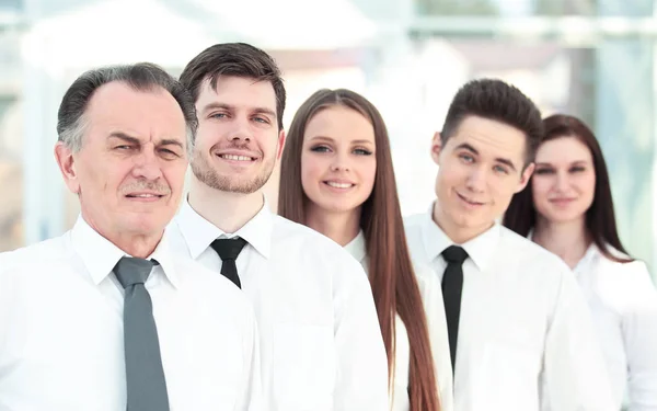 Group of young business people standing in a row. — Stock Photo, Image