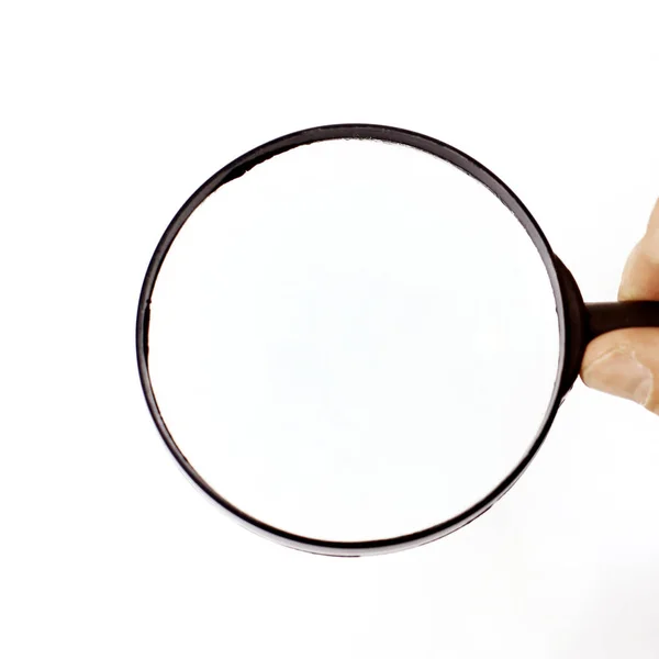 Closeup.magnifier in the hand of businessman. — Stock Photo, Image