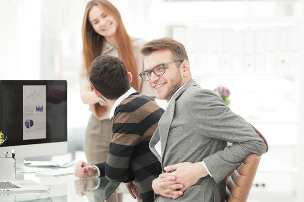 Successful business team in the workplace in the office — Stock Photo, Image