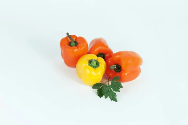 Bell pepper and sprig of parsley .isolated on a white background — Stock Photo, Image