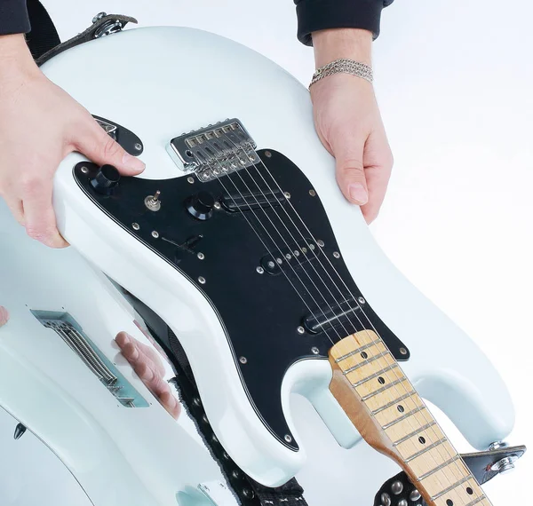 Closeup.the hand of the musician stroking the strings of a guit — Stock Photo, Image