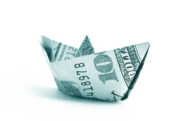 Hundred dollar banknote folded as a boat, finance concept Royalty Free Stock Images