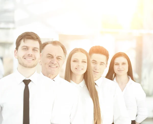 Close up. confident business team on blurred background office — Stock Photo, Image