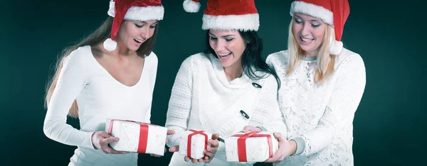 Three happy young women in costume of Santa Claus with Christma — Stock Photo, Image