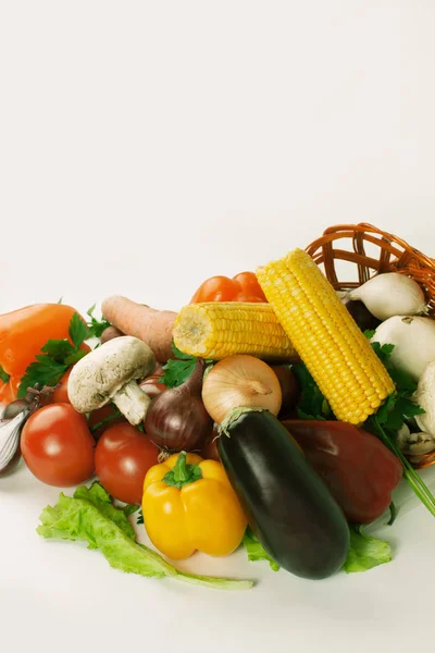 Closeup.mushrooms and a variety of fresh vegetables in a wicker — Stock Photo, Image