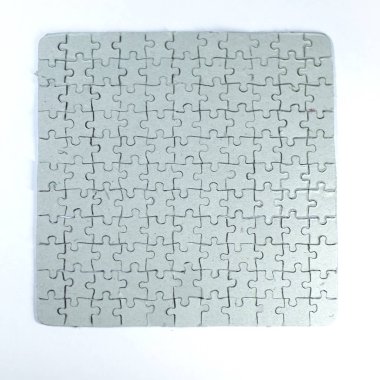 yakın çekim. puzzle parçaları toplanan gri boş tebrik kartı 
