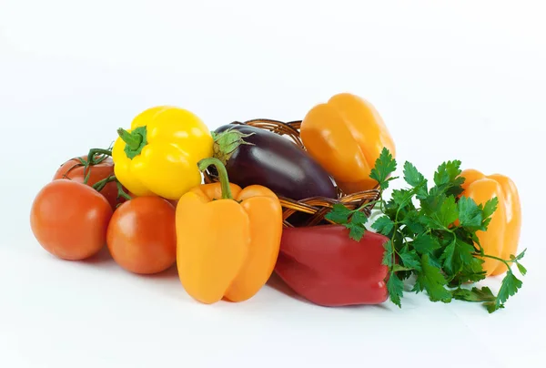 Fresh eggplant,tomatoes,bell pepper and parsley isolated — Stock Photo, Image