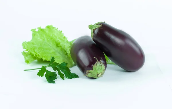 Eggplant,lettuce and parsley on a white background — Stock Photo, Image