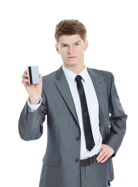 Successful businessman holding out a blank business card. — Stock Photo, Image