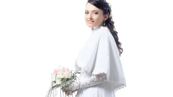 Portret van een jonge vrouw in een trouwjurk — Stockfoto