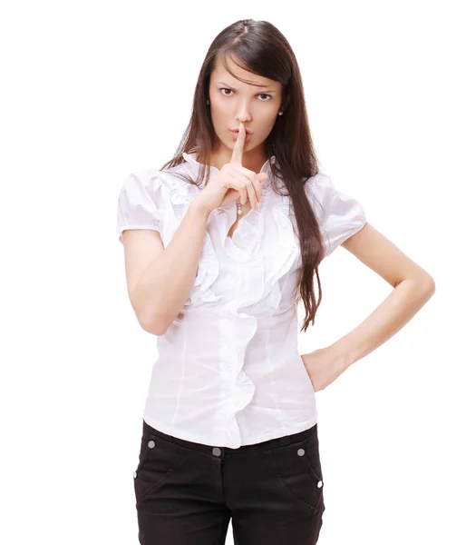 Jonge ernstige zakenvrouw, brengen een vinger naar haar lippen — Stockfoto