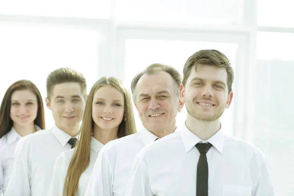 Close up.boss and confident business team standing in a row — Stock Photo, Image