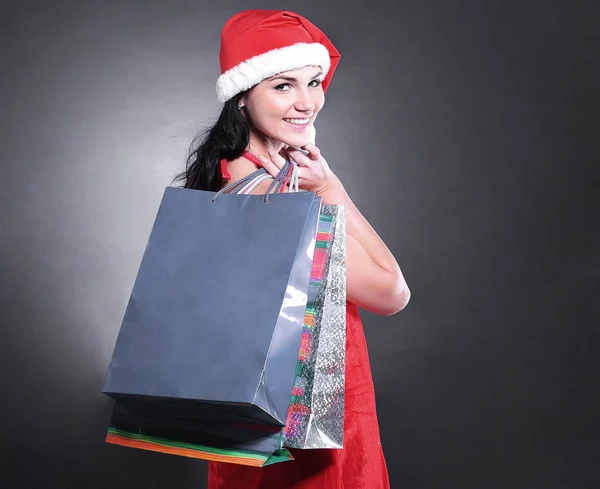 Glad ung kvinna klädd som jultomte med den jul sho — Stockfoto