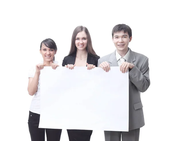 Exitoso equipo de negocios sosteniendo un banner en blanco . —  Fotos de Stock