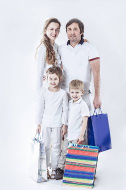 mutlu bir aile ile shopping.photo beyaz bir arka plan üzerinde.