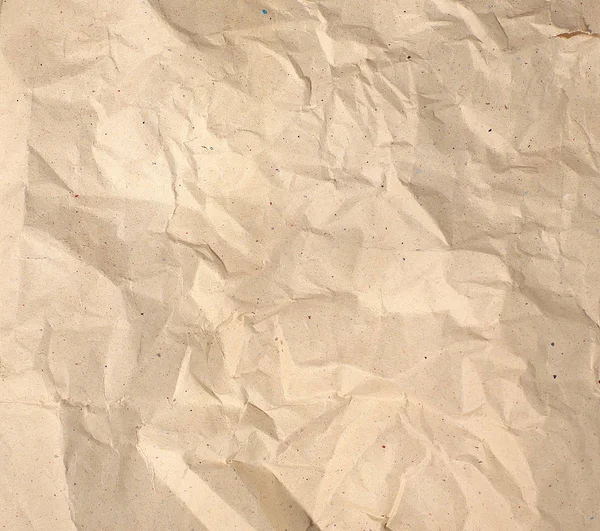 Crumpled piece of paper for the label — Stock Photo, Image