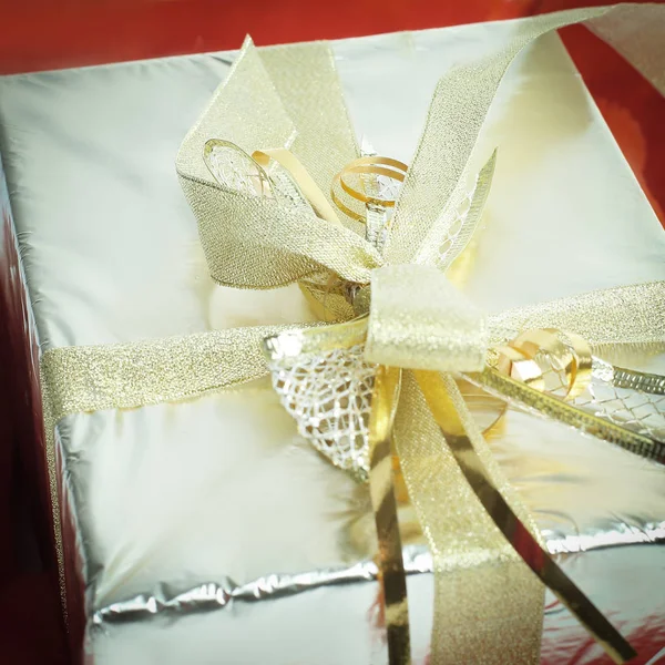 Closeup.boxes met geschenken met gouden lint — Stockfoto