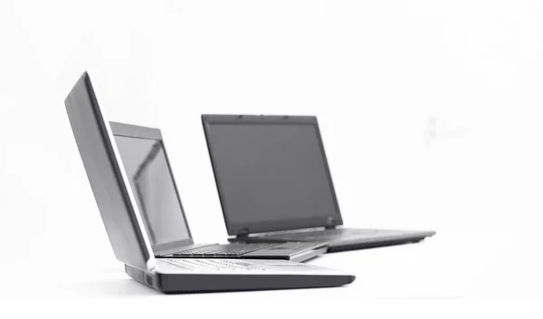 Open laptop on the desktop in an empty office — Stock Photo, Image