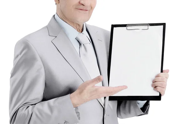 Mogen affärsman pekar på tom sheet.isolated på en vit — Stockfoto