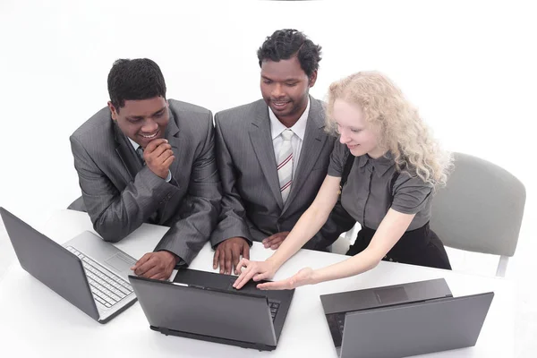 Successful business team discussing the information with the la — Stock Photo, Image