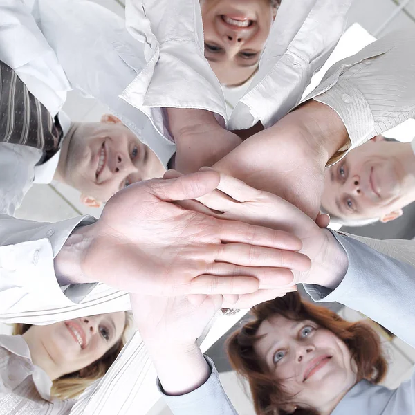 Close up.bottom view.successful business team.isolated su bianco — Foto Stock