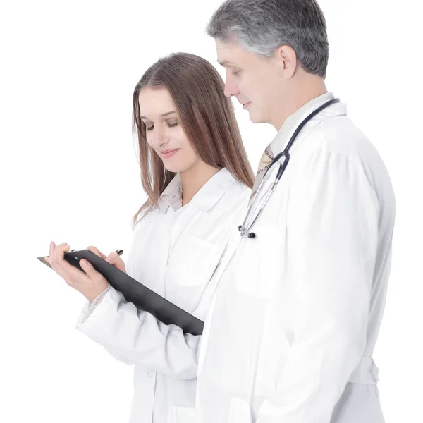 Two confident doctor discussing the patients medical card. — Stock Photo, Image