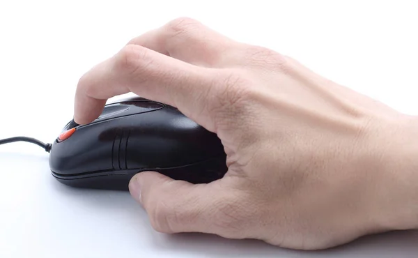 Hand on a computer mouse on a white table — Stock Photo, Image