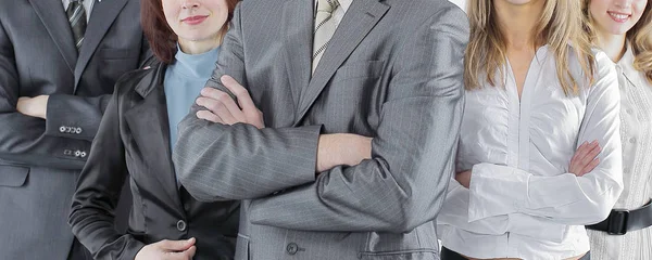 Team leader stands with coworkers in background — Stock Photo, Image
