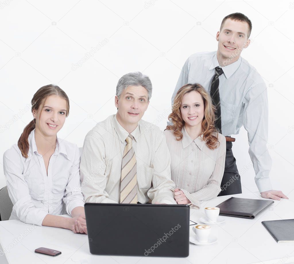 portrait of successful business team sitting behind a Desk