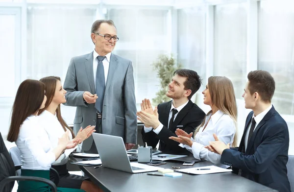 Successful businessman and business team at a seminar in modern office — Stock Photo, Image