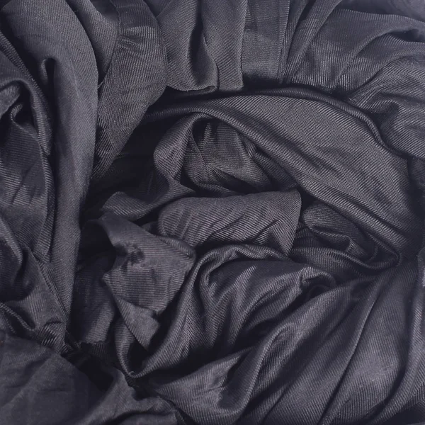 Творческий абстрактный фон из сложенной черной ткани . — стоковое фото