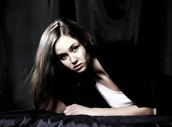 Closeup. portrait of stylish young woman . isolated on a black — Stock Photo, Image