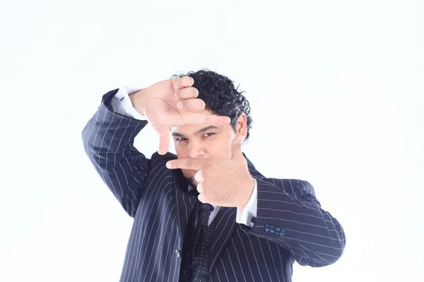 Closeup of a confident businessman holding hands in front of his face — Stock Photo, Image