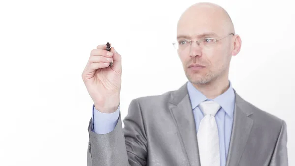 Handsome businessman pointing the marker at the virtual point Stock Image