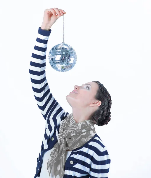 Closeup.beautiful young woman holding a mirror ball — Stock Photo, Image