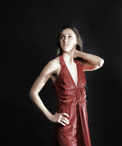 Mulher nova na moda em vestido vermelho olhando para o espaço de cópia. iso — Fotografia de Stock