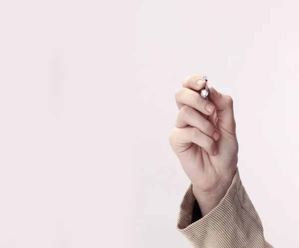 Closeup . businessman showing a pen on a virtual point.isolated — Stock Photo, Image