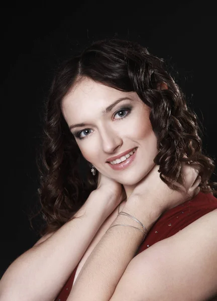 Portrait of beautiful woman in red dress posing for the camera — Stock Photo, Image