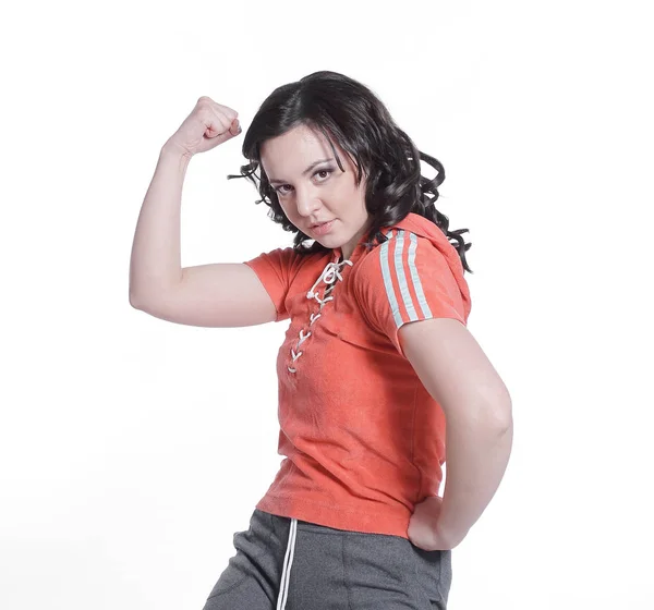 Uroczą kobietą w dres Wyświetlono biceps.isolated biały — Zdjęcie stockowe