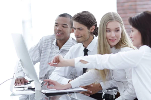 Professional business team discussing new information in the office — Stock Photo, Image